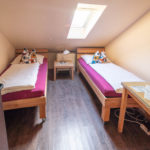 Doppelzimmer im Dachgeschoss mit Etagenbad